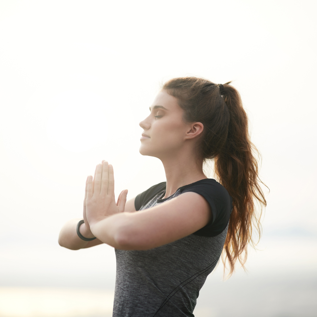 woman practicing yoga